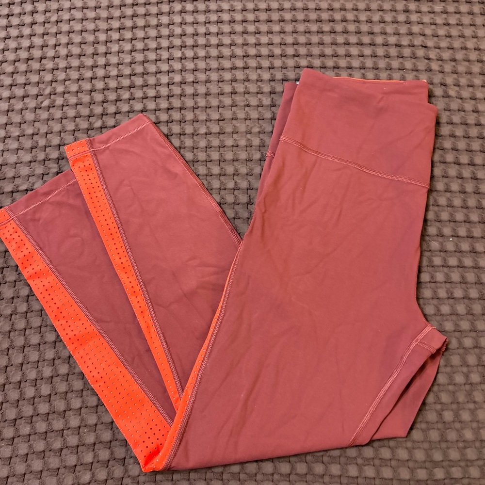 Athleta Ultimate Stash Pocket M Rust Orange Laser Cut SuperSonic